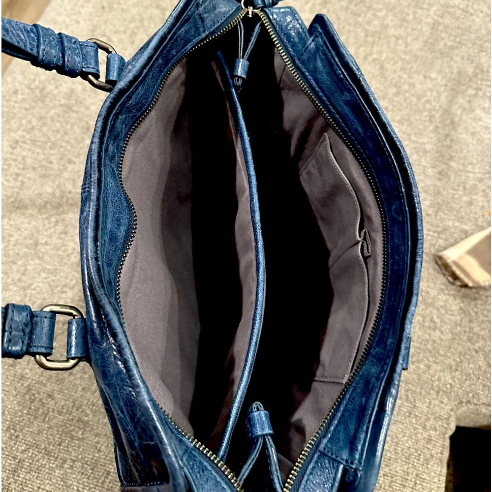 This is a Frye leather bag, slightly used. Good condition. Very spacious.